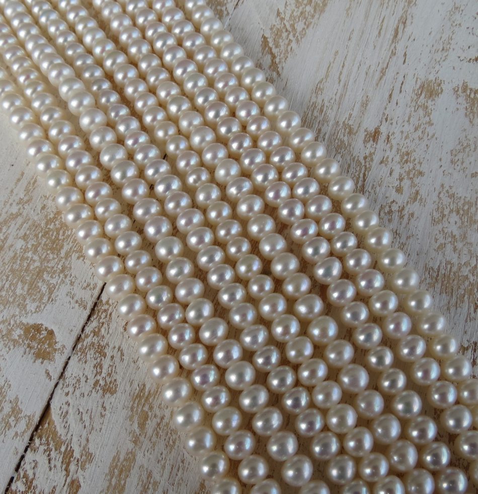 Small round Freshwater Pearl beads by string