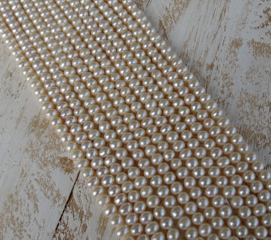 Medium round Freshwater Pearl beads by string