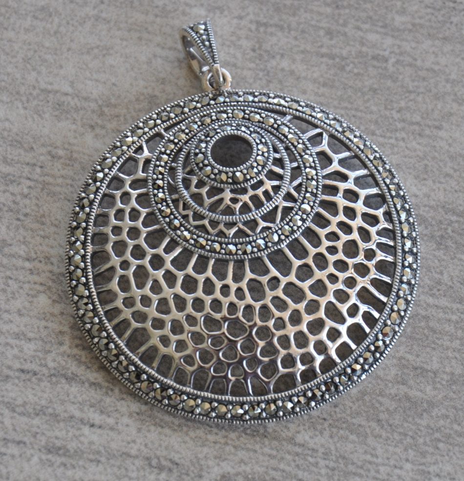 Round sterling silver and marcasite pendant