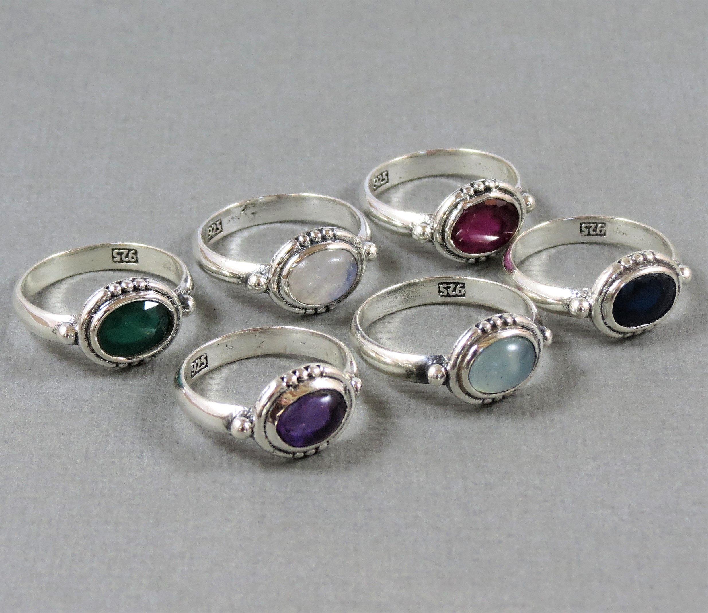 various oval gemstone rings with sterling silver ball detail