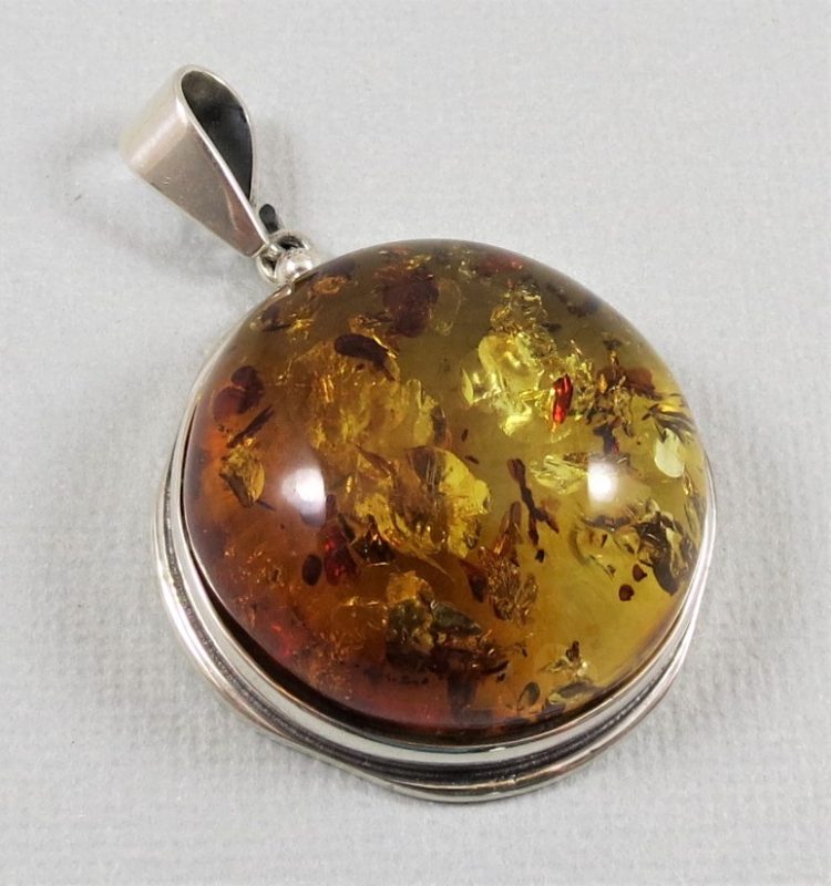 amber pendant with sterling silver border