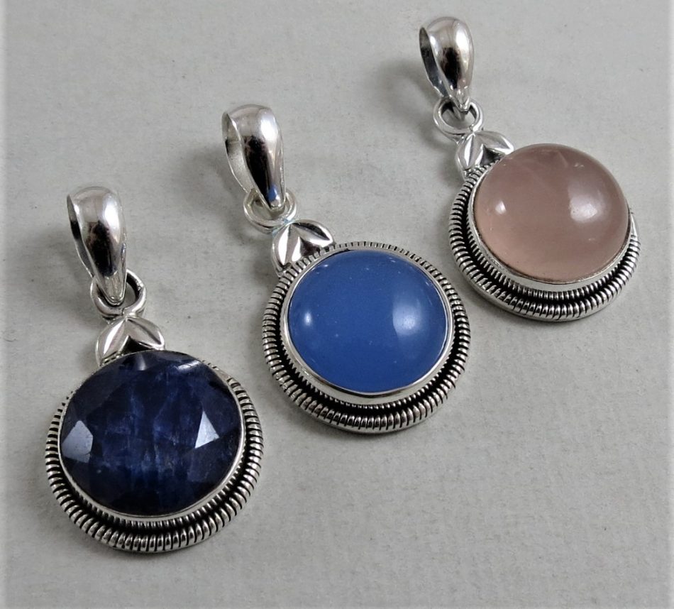 round sterling silver and various gemstone pendant