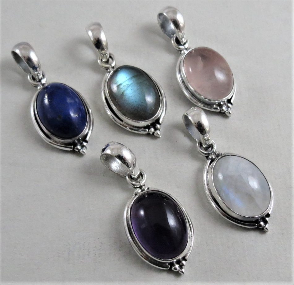 oval sterling silver and various gemstone pendant