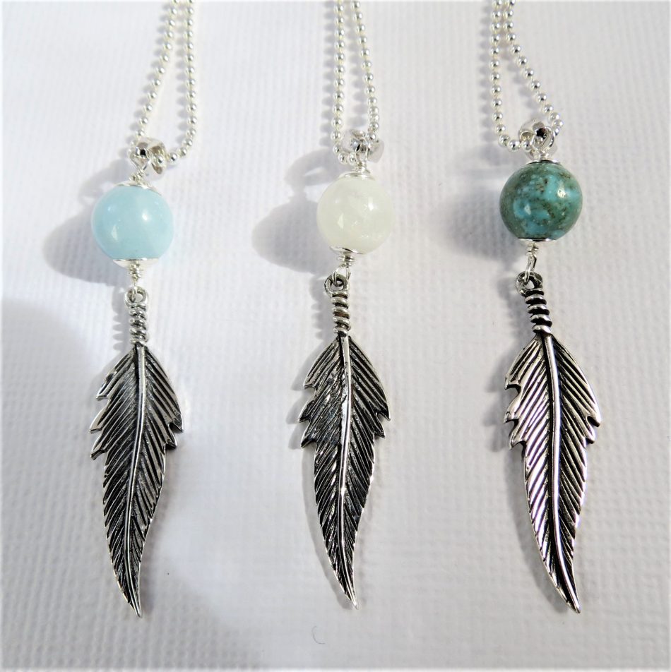 sterling silver and various gemstone feather necklace