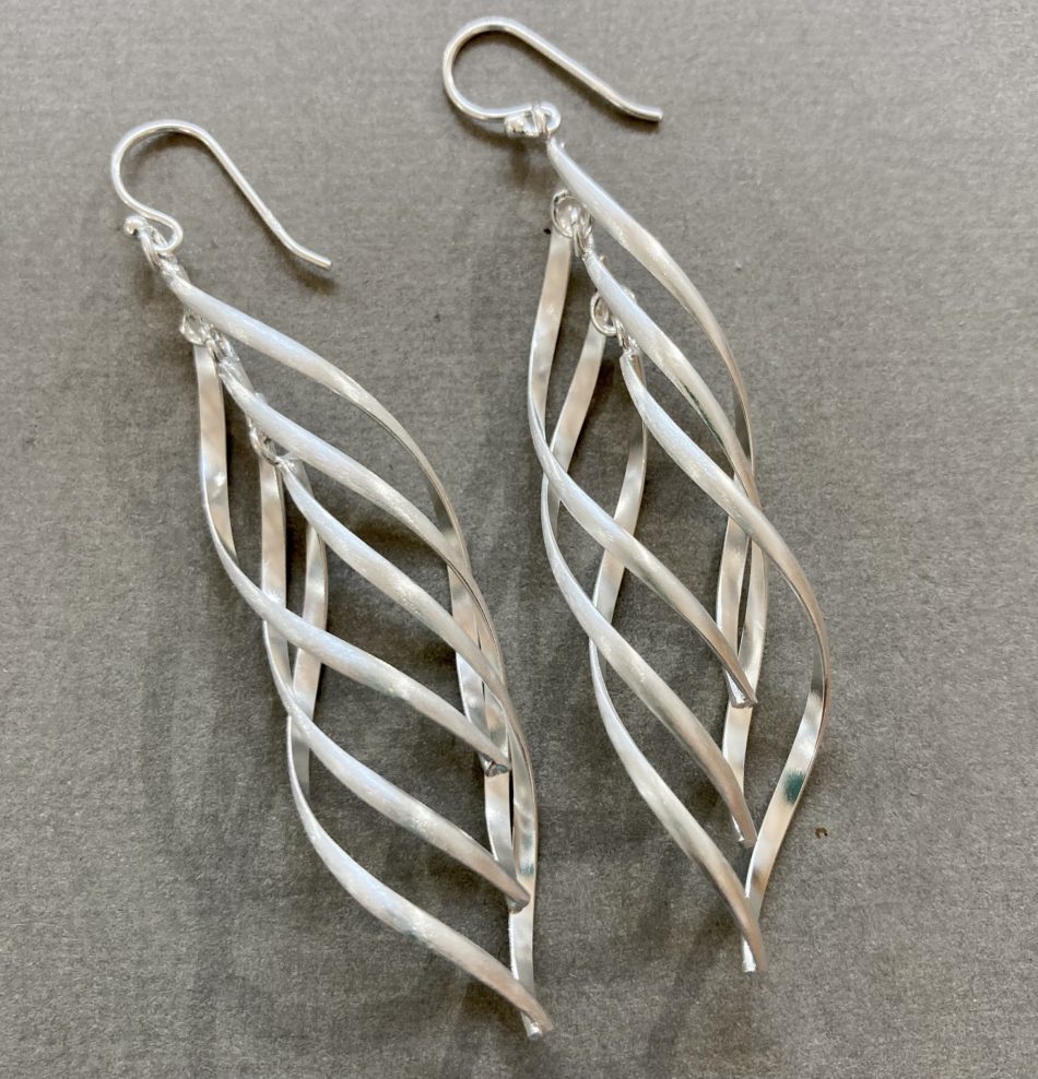 Sterling silver spiraled drop earrings with a matte finish