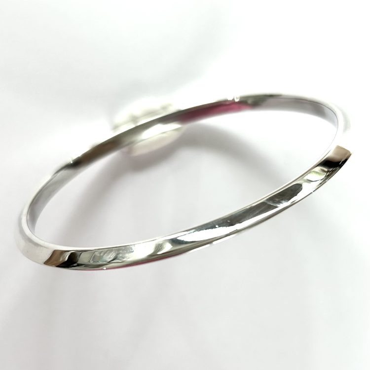 Sterling silver edged detail solid bangle