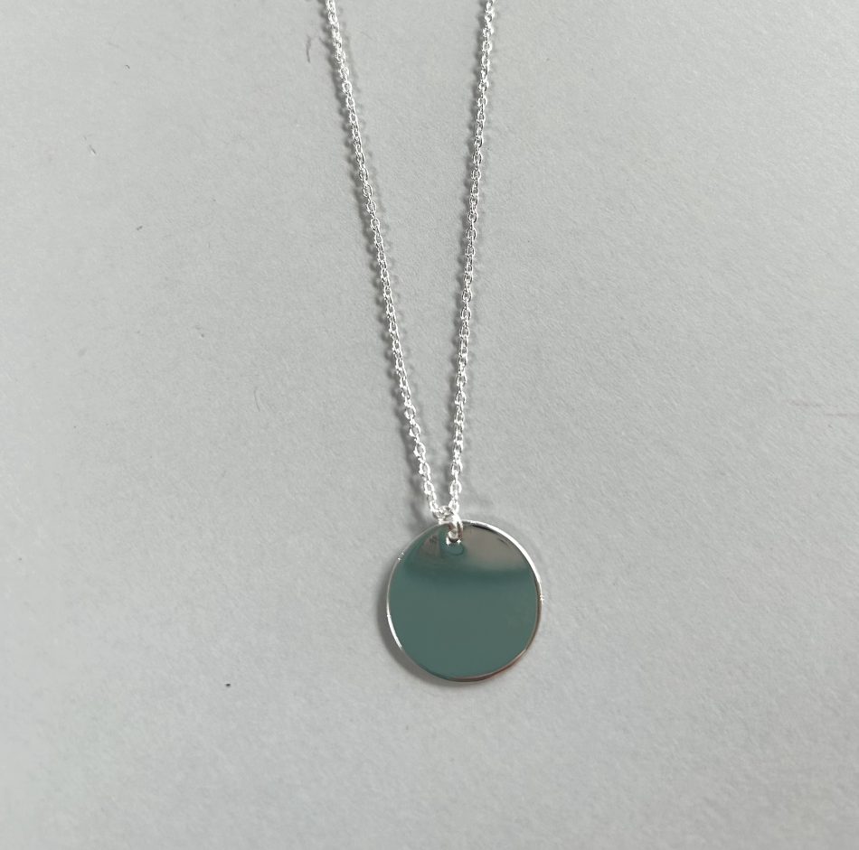 Sterling silver necklace with small disc pendant