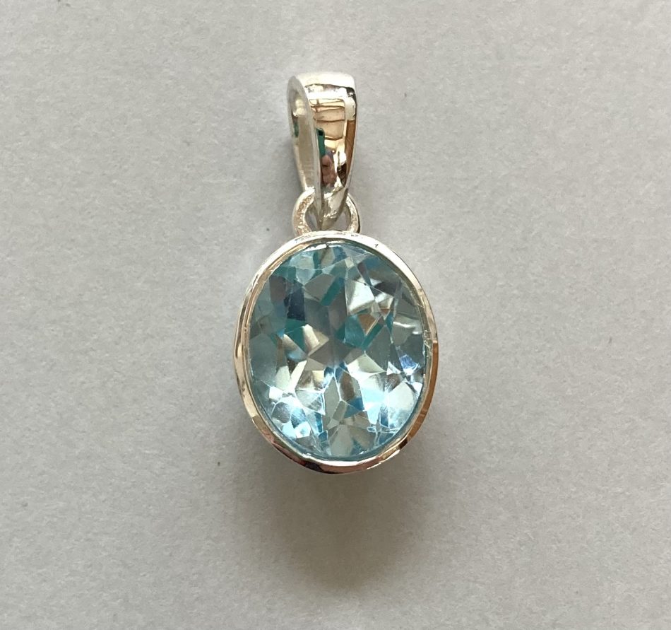 Sterling silver and oval Blue Topaz pendant