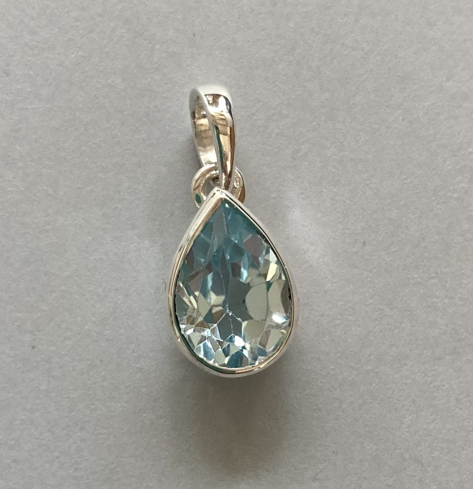 small Sterling silver and teardrop Blue Topaz pendant