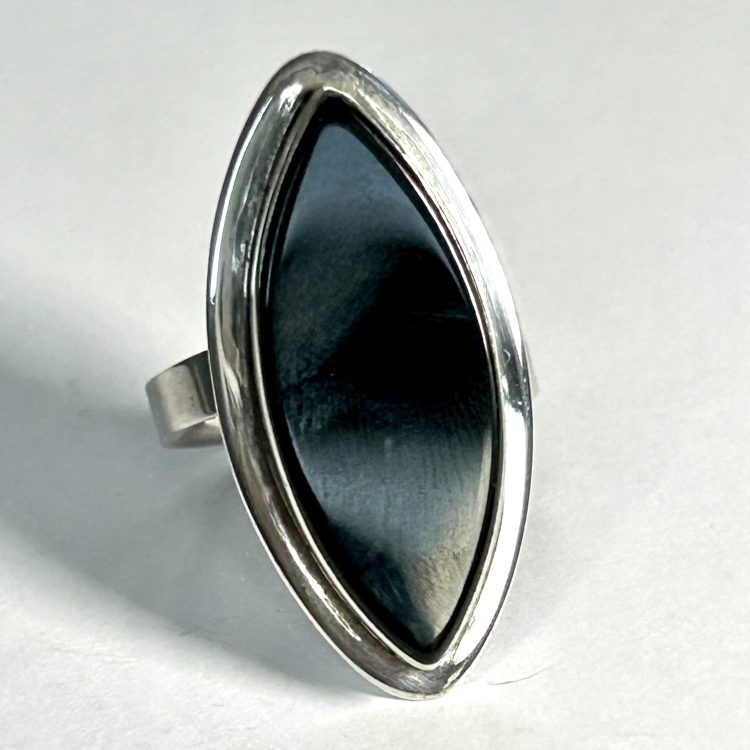 elliptical black onyx ring with sterling silver border