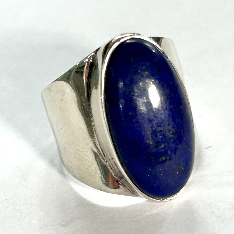 oval lapis lazuli ring with wide sterling silver band