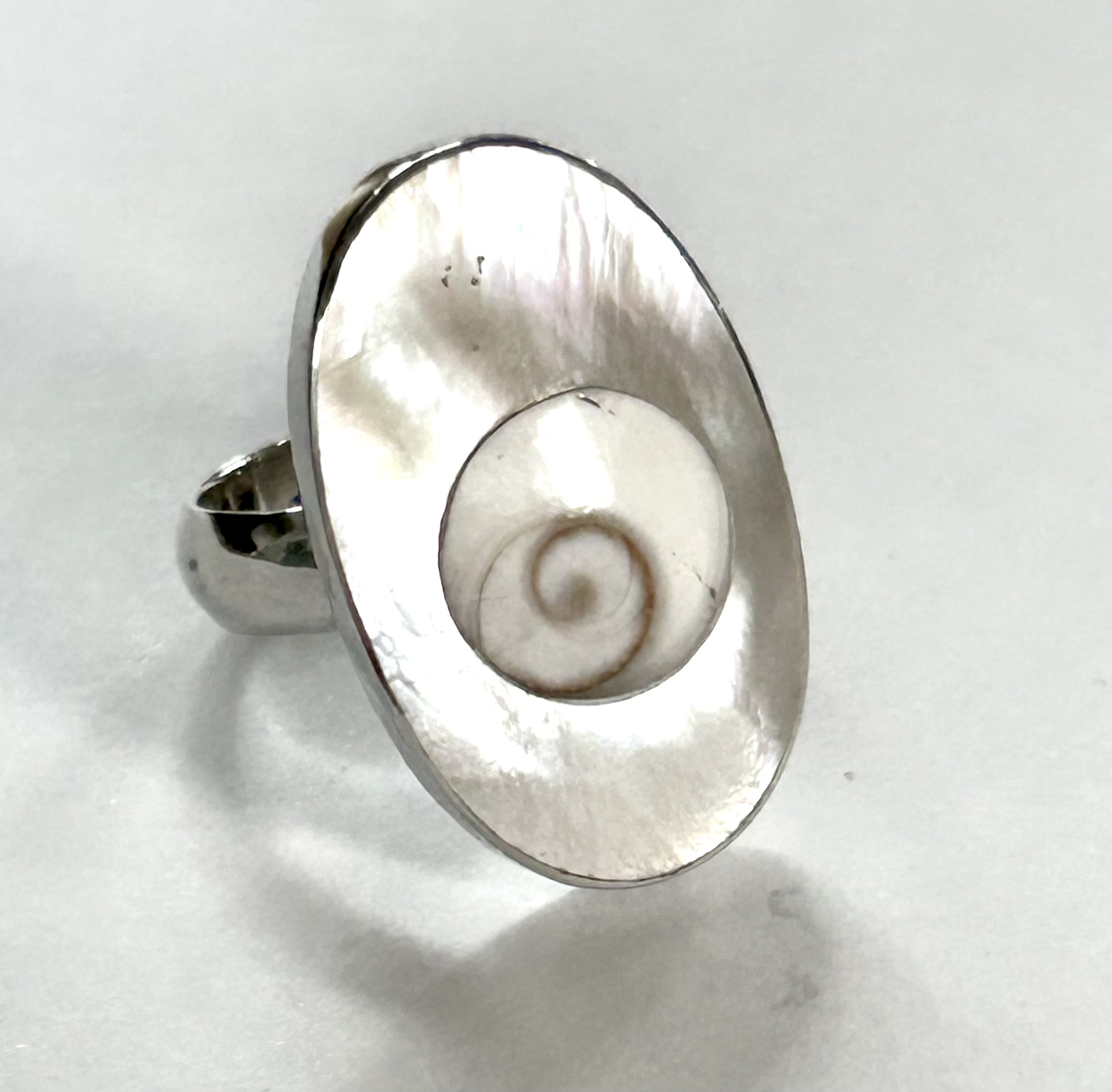 oval sterling silver and mother of pearl ring with shell spiral