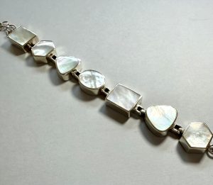 multi shaped sterling silver and mother of pearl bracelet