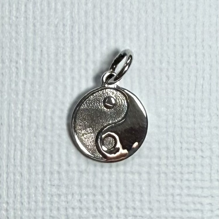 tiny sterling silver peace sign pendant