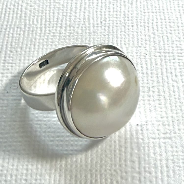 large round sterling silver and white pearl ring