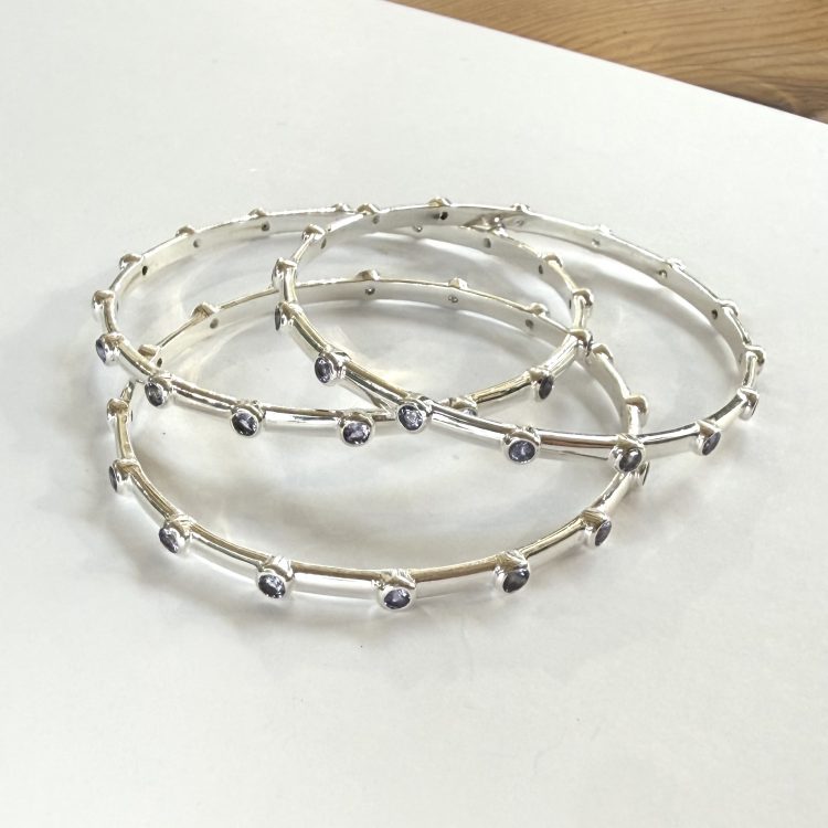 sterling silver and tanzanite bangle - each sold separately