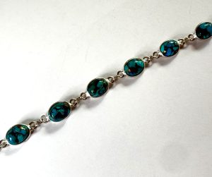 sterling silver and oval copper turquoise bracelet