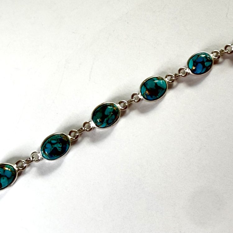 sterling silver and oval copper turquoise bracelet