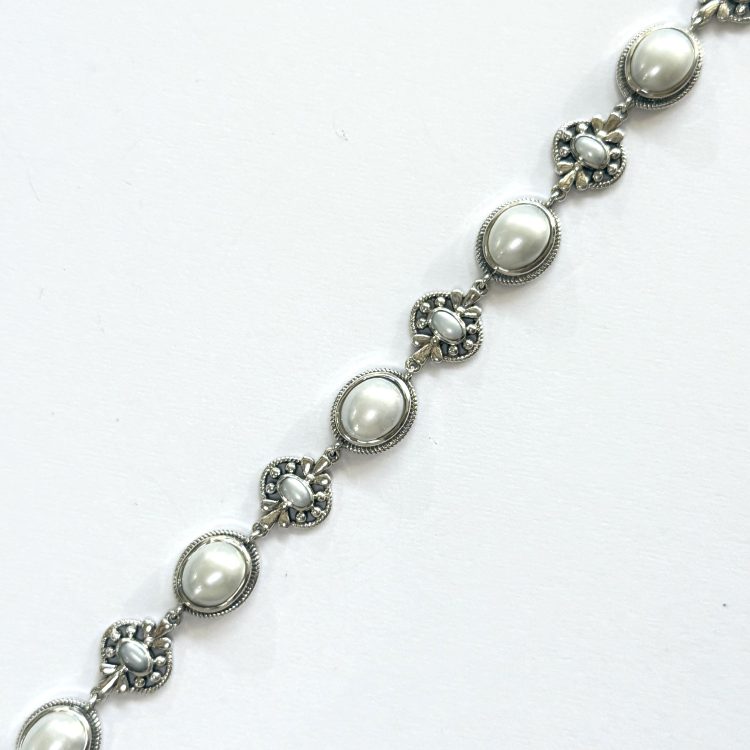 sterling silver decoratively detailed white pearl bracelet