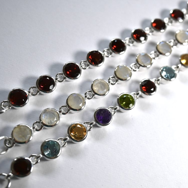 sterling silver and various round faceted gemstone bracelet