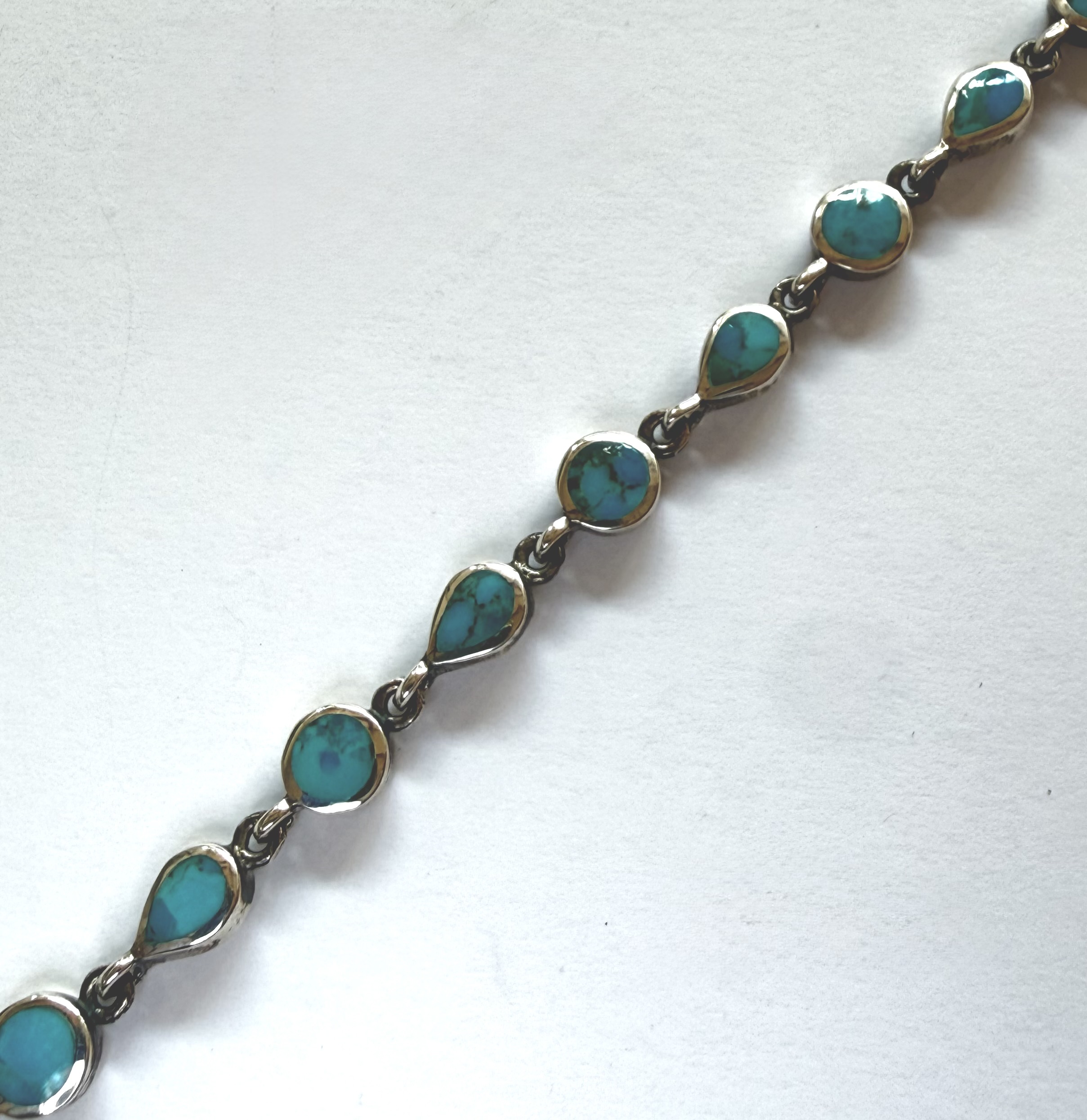 sterling silver and circle and teardrop turquoise bracelet