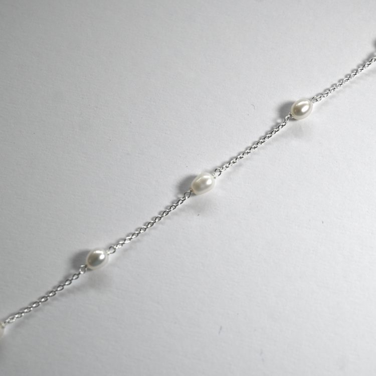 dainty white pearl with sterling silver chain bracelet