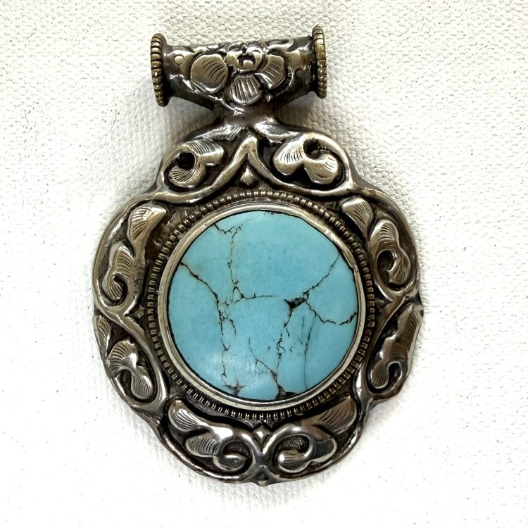 antique Indian silver-plated pendant with turquoise