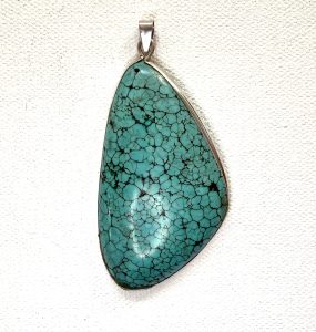 angular sterling silver and turquoise pendant