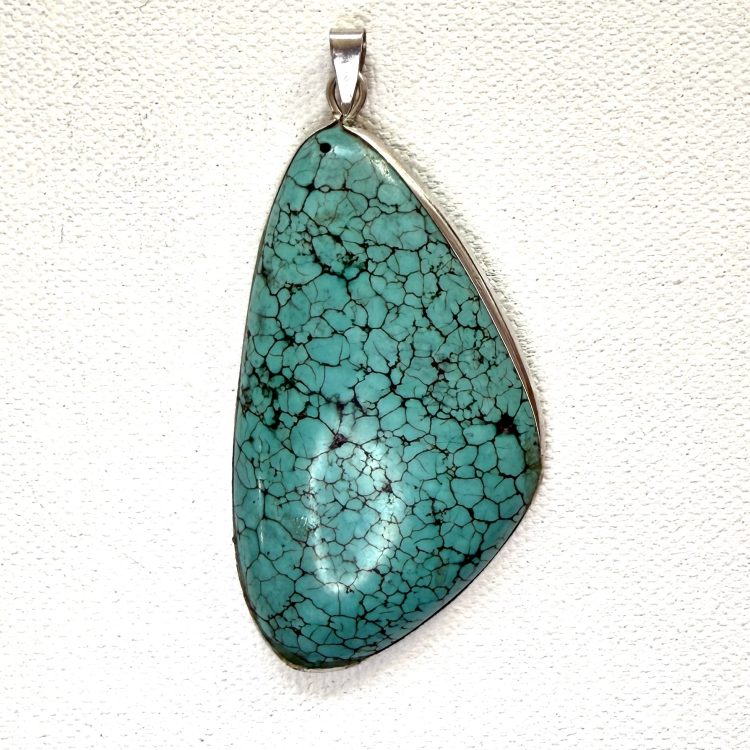 angular sterling silver and turquoise pendant
