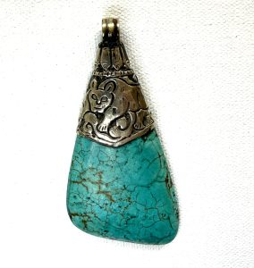 antique Indian silver-plated animal pendant with turquoise