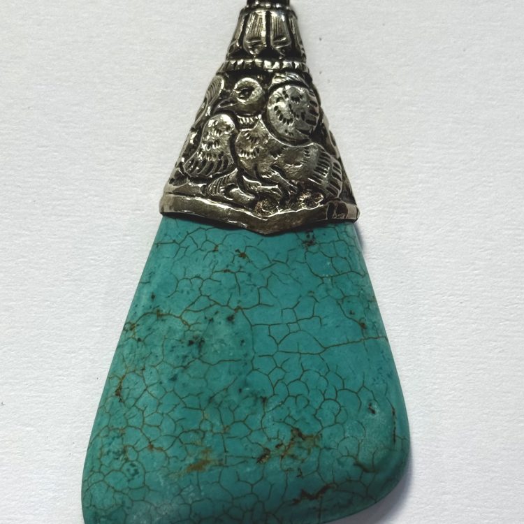 angular sterling silver and turquoise pendant with bird detail