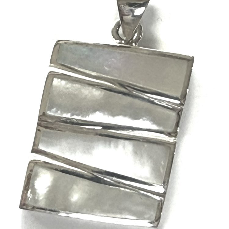 modern sterling silver and 4 step mother of pearl pendant