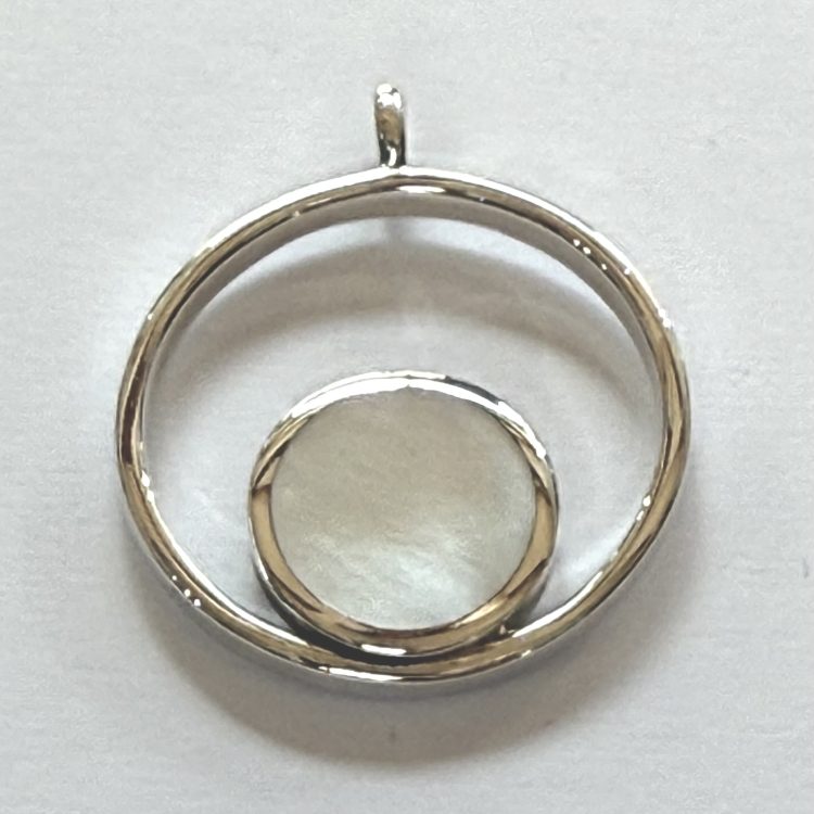 round sterling silver and mother of pearl pendant