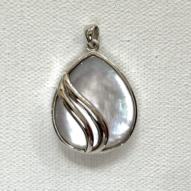 modern teardrop mother of pearl pendant with double sterling silver waves