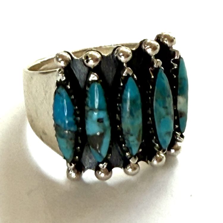 sterling silver wide band ring with 5 elliptical turquoise gemstones
