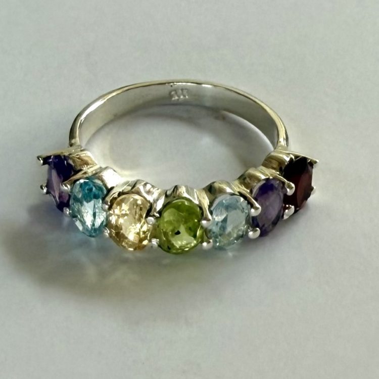 sterling silver and multi faceted gemstone ring