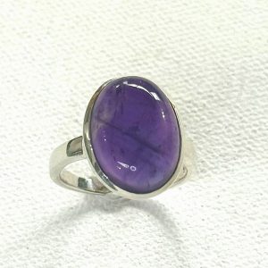 sterling silver and oval cabochon amethyst ring