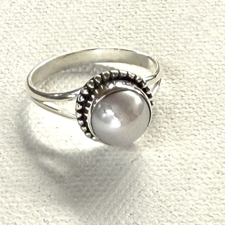 sterling silver and white pearl ring with dotted border