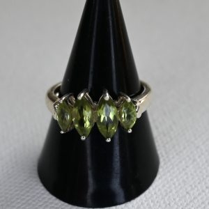 sterling silver and 4 elliptical peridot ring