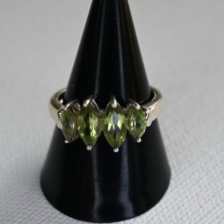 sterling silver and 4 elliptical peridot ring