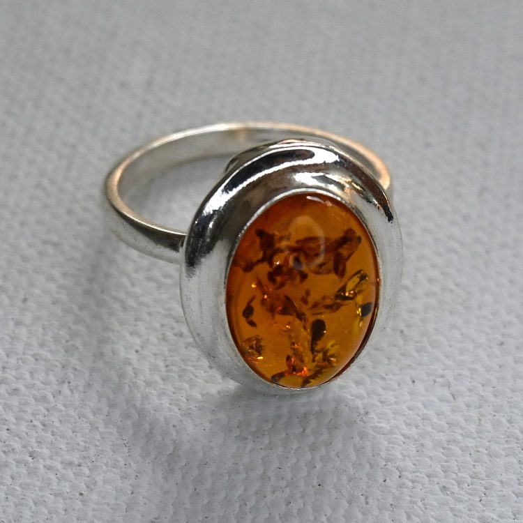 oval amber ring with sterling silver border