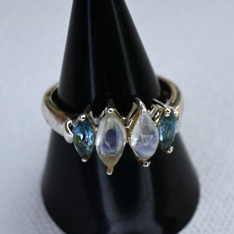 sterling silver and elliptical moonstone and blue topaz ring