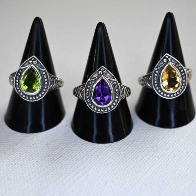 various teardrop gemstone ring with dotted sterling silver border