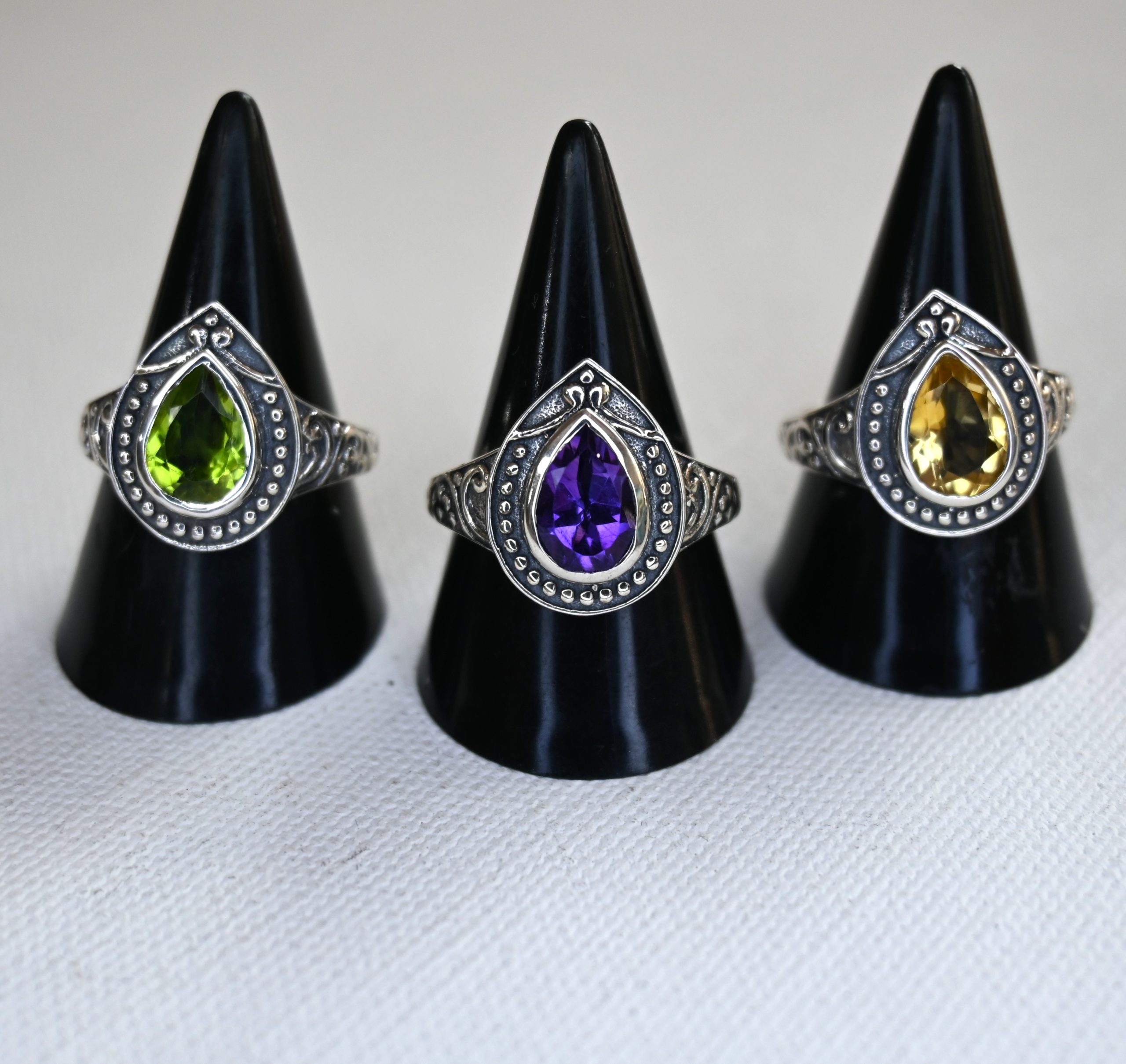various teardrop gemstone ring with dotted sterling silver border