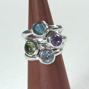 sterling silver and various gemstone round faceted ring